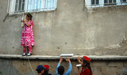 <p>The children of Khorog prepare a theatrical event for the celebration of the <em>Idi Nur</em> – the Holiday of Light, the commemoration of Aga Khan IV first visit to the region. They decided spontaneously to surprise the elders. They dressed up and invited all the neighbourhood to join the recitations of religious texts, singing, reciting poems in English, and dancing to traditional and disco music.<br /><br />Photo: Małgorzata Biczyk, Khorog, Tajikistan, 2011<br />Max Planck Institute for Social Anthropology</p>