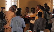 <p>In celebration of the translation of the Old Testament’s “Book of Nehemiah” into the Moro language, Nuba Moro Church leaders of representative denominations and clans bless the just-­published text. The image illustrates how the social organisation of the Moro ethnic group is transformed into Church hierarchies.<br /><br />Photo: Siri Lamoureaux, Khartoum, Sudan, 2012<br />Max Planck Institute for Social Anthropology</p>
