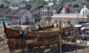 <p>Boat building in Jāffarābād, a port town along the Saurāshtrā coast of Gujarāt, India. One summer morning in March 2015 during the boat building season. The Saurāshtrā coastline along the Arabian Sea has a long tradition of building wooden boats.<br /><br />Photo: Varsha Patel, Jāffarābād, Gujarāt, India, 2015<br />Max Planck Institute for Social Anthropology</p>