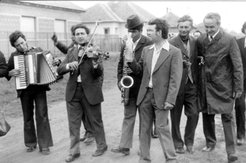 The musicians escort the last guests home in the early hours of the morning.