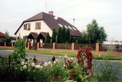 This house was built in the 1990s by a newcomer to the community who produces flowers for the national market; he declined to be inter- viewed or photographed.