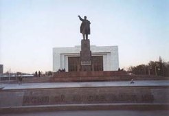 A Russian Orthodox church and a large monument to Lenin that dominated a central square are two contrasting signs of Russia's historical impact on the city of Bishkek, capital of predominantly Muslim Kyrgyzstan. The National History Museum, visible behind the Lenin statue, still devotes as much space to the myths and heroes of Marxism-Leninism as it does to Kyrgyz ethnic traditions (these photos were taken in April 2003, but the Lenin statue was removed overnight and without consultation in August 2003).