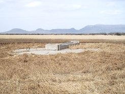 An abandoned borehole in the desert after the ´Turbi Massacre’ in 2005, next to a waterhole in Marsabit Forest.