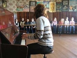 Views on education: employees of the house of culture instruct children of different age groups in musical performance and theater.