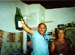 This elderly lady and her son belong to the opposite end of the social spectrum from their mayor. They own only a small house and garden in the upper hamlet, and are dependent on state benefits.
