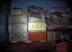 Cultural property. Migrants from China brought these richly-decorated chests along to sell them in their new home. The local Kazaks, however, showed little interest in traditional handicraft.