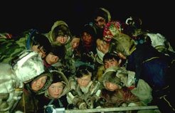 The extended family of a private reindeer herding camp watching my visual fieldwork material. Showing this to the informants developed to a invaluable method, since their comments on my films provided additional information.