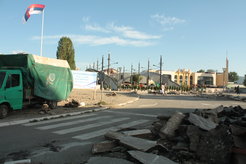The architecture of an ethnically divided city after the Serbian municipality of the town decided to plant trees on 'their side of the bridge' (Mitrovica 2014)