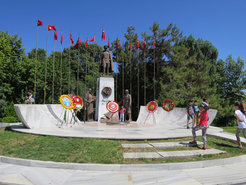 Monument of Atatürk, the founder of the Republic, with roses and children.