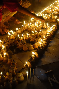 Clay candle holders in the Pagoda during Thadingyut festival, Pathein, October 2015.