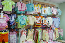 A baby clothes firm managed by a married couple; in addition to manufacturing, the business includes a small retail chain.
