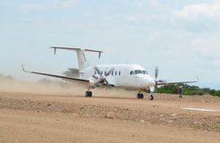 Plane of an Irish oil company landing on the temporary airstrip in Arbore, Ethiopia, 2014