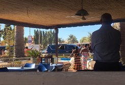 The newly elected president Adama Barrow waves at by passers, Banjul, February 2018