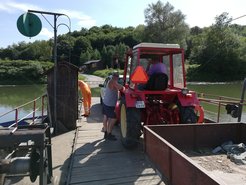 Local farmers cross the San on the Bachórzec-Sielnica ferry on their way back from the fields.