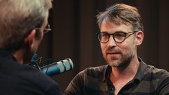 In this episode, Christoph Brumann talks to Philipp Demgenski about his book "Seeking a Future for the Past: Space, Power, and Heritage in a Chinese City". The conversation centers around Demgenski's fieldwork in the Qingdao neighborhood of Dabaodao, a former German colony, where he explores the transformation from a slum to a heritage site. Demgenski's research aims to answer a crucial question: why do urban redevelopment projects in China often go wrong, stagnate, or fail? His book delves into this issue, focusing on the city's urban redevelopment projects that have stalled due to a preservation mandate imposed by the government. Through ten years of ethnographic fieldwork, Demgenski sheds light on the diverse experiences of local residents, migrant workers, preservationists and government officials, revealing a bureaucracy that is often scattered and ineffective, leading to deadlocks and stalled redevelopment projects.